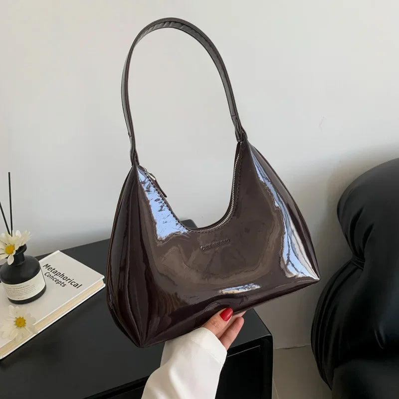 Elegant burgundy shoulder bag with a glossy finish