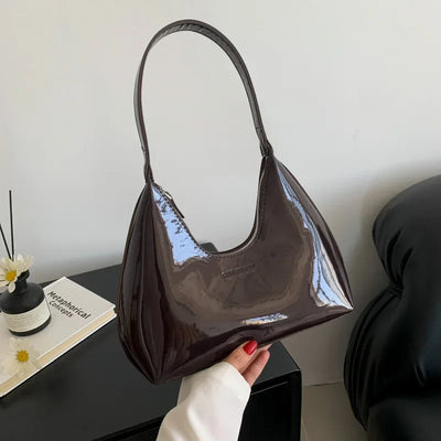 Elegant burgundy shoulder bag with a glossy finish