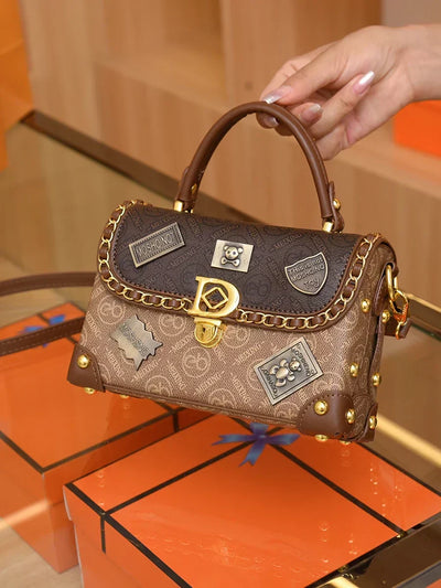 Retro shoulder bag with monogram and gold details Zelda™