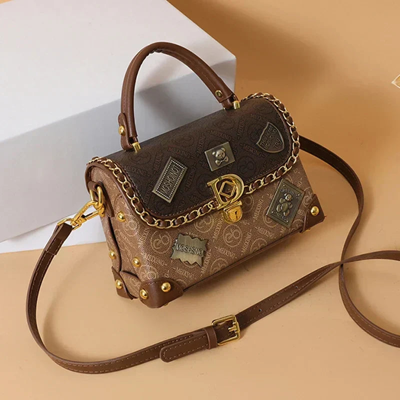 Retro shoulder bag with monogram and gold details Zelda™
