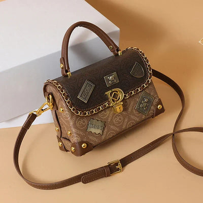 Retro shoulder bag with monogram and gold details Zelda™
