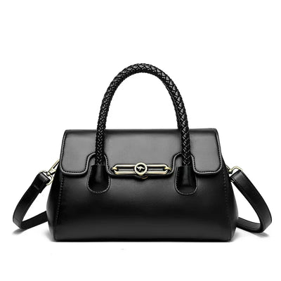 ronja™ – Classic Handbag with Woven Handle and Gold Accents