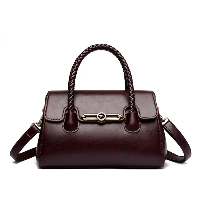 ronja™ – Classic Handbag with Woven Handle and Gold Accents