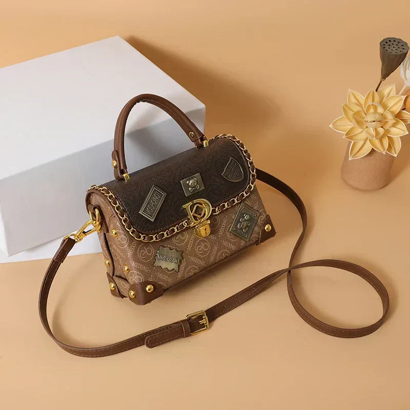 Retro shoulder bag with monogram and gold details Zelda™