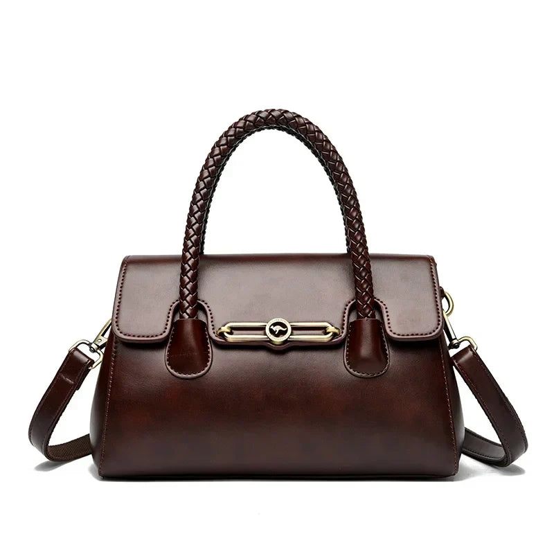 ronja™ – Classic Handbag with Woven Handle and Gold Accents