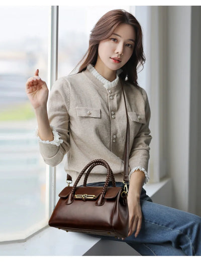 ronja™ – Classic Handbag with Woven Handle and Gold Accents