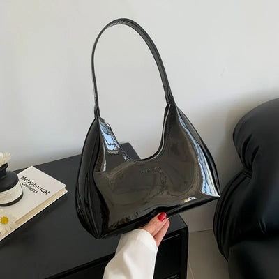 Elegant burgundy shoulder bag with a glossy finish