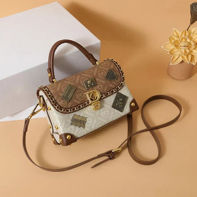 Retro shoulder bag with monogram and gold details Zelda™