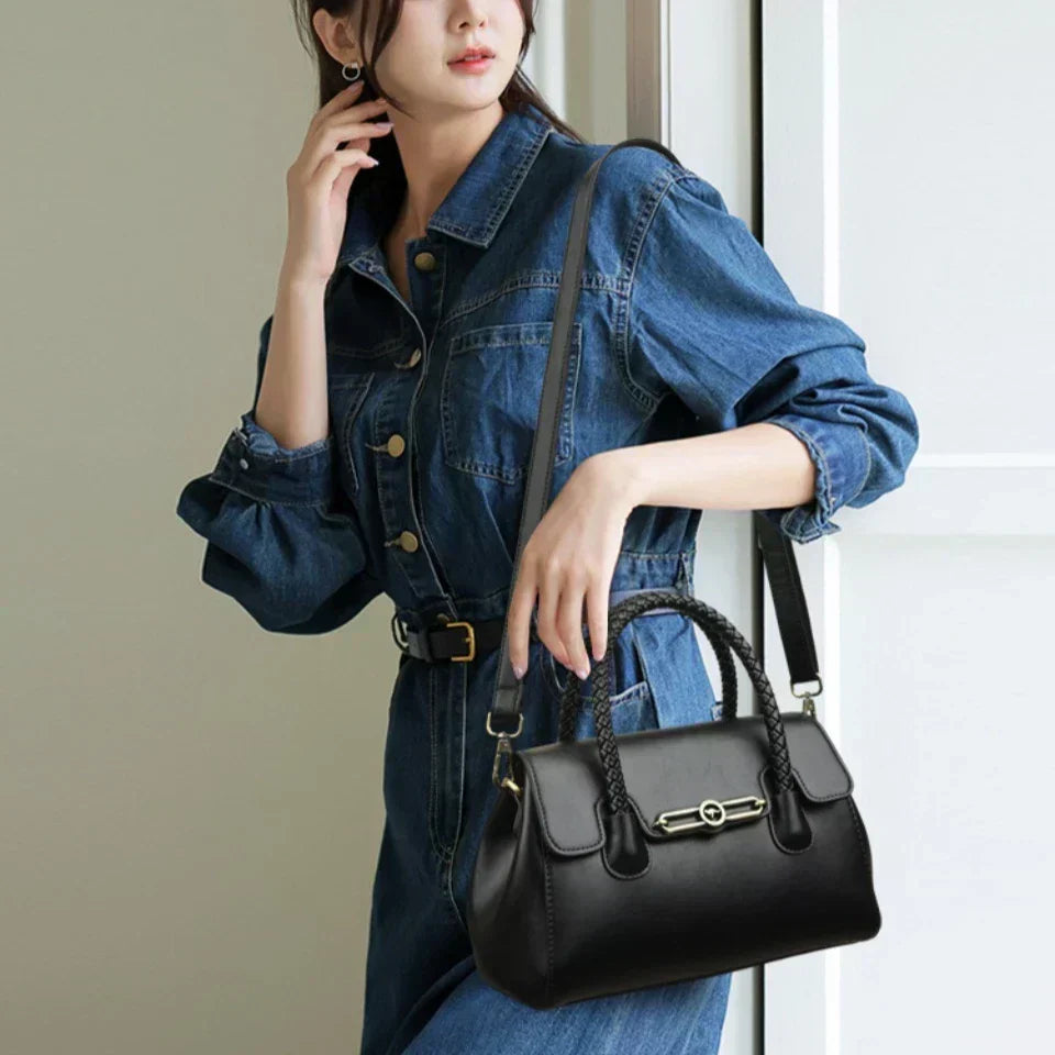 ronja™ – Classic Handbag with Woven Handle and Gold Accents