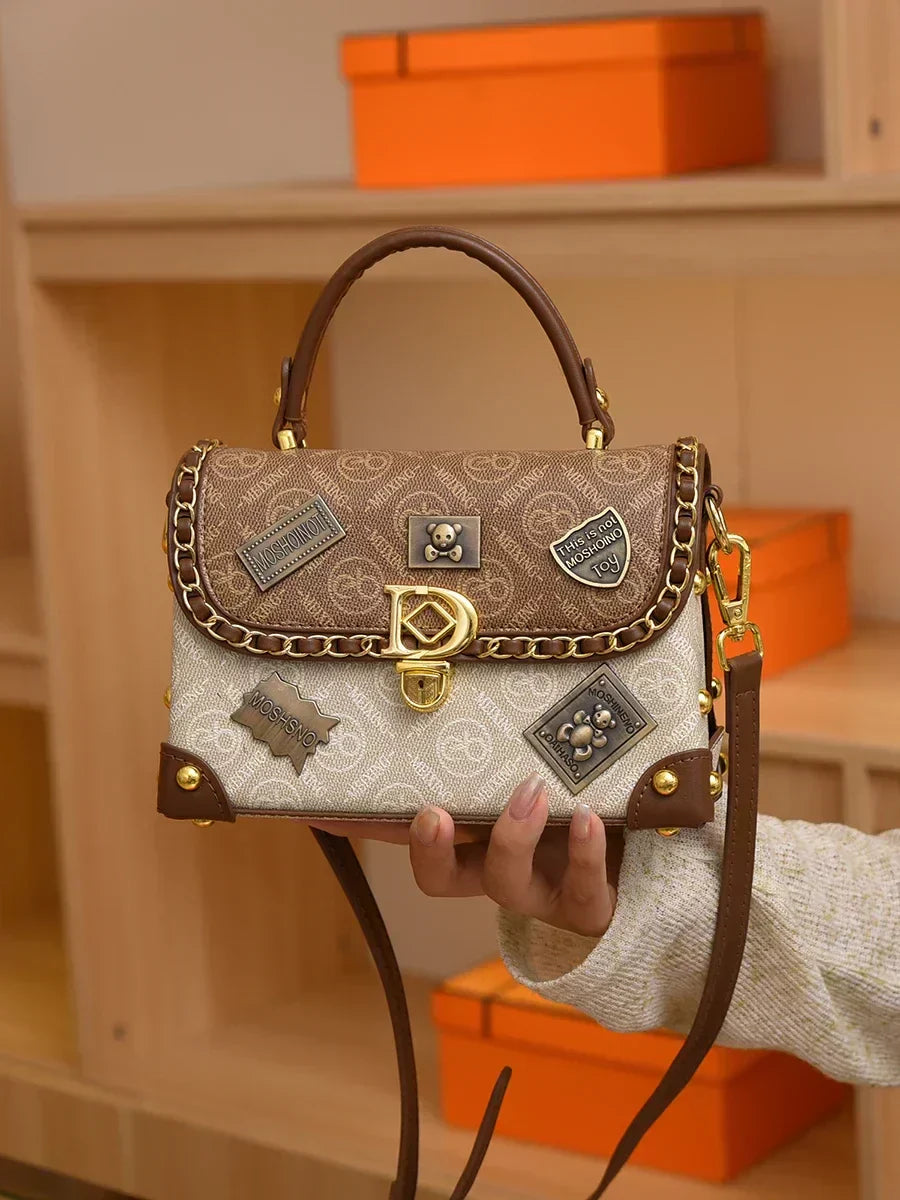 Retro shoulder bag with monogram and gold details Zelda™
