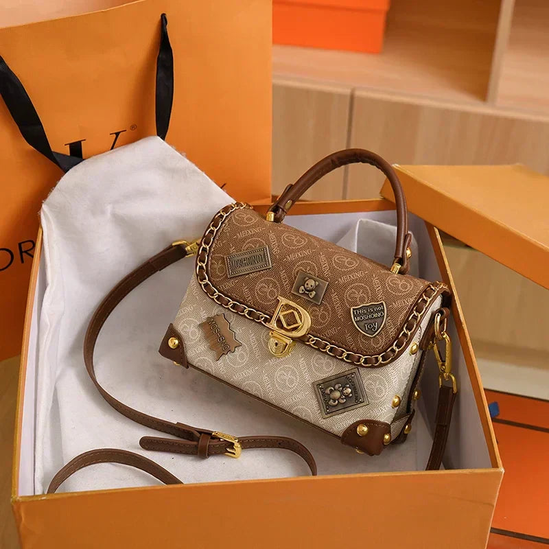 Retro shoulder bag with monogram and gold details Zelda™