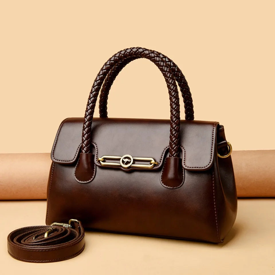 ronja™ – Classic Handbag with Woven Handle and Gold Accents