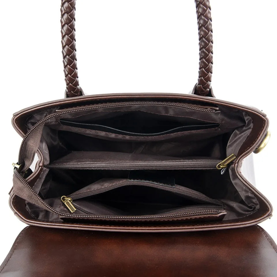 ronja™ – Classic Handbag with Woven Handle and Gold Accents