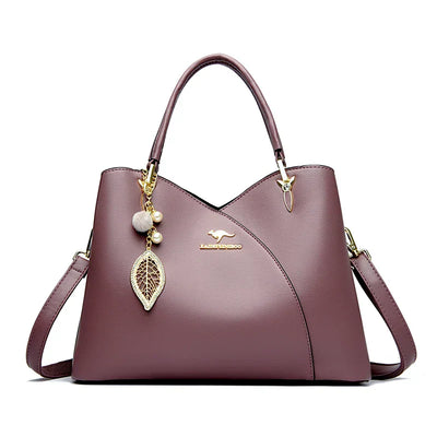 Elegant black shoulder bag with stylish charms