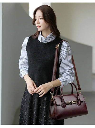 ronja™ – Classic Handbag with Woven Handle and Gold Accents