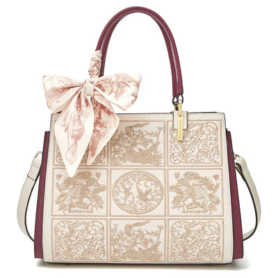 Sylvia™ – Unique crossbody bag with embroidery and bow
