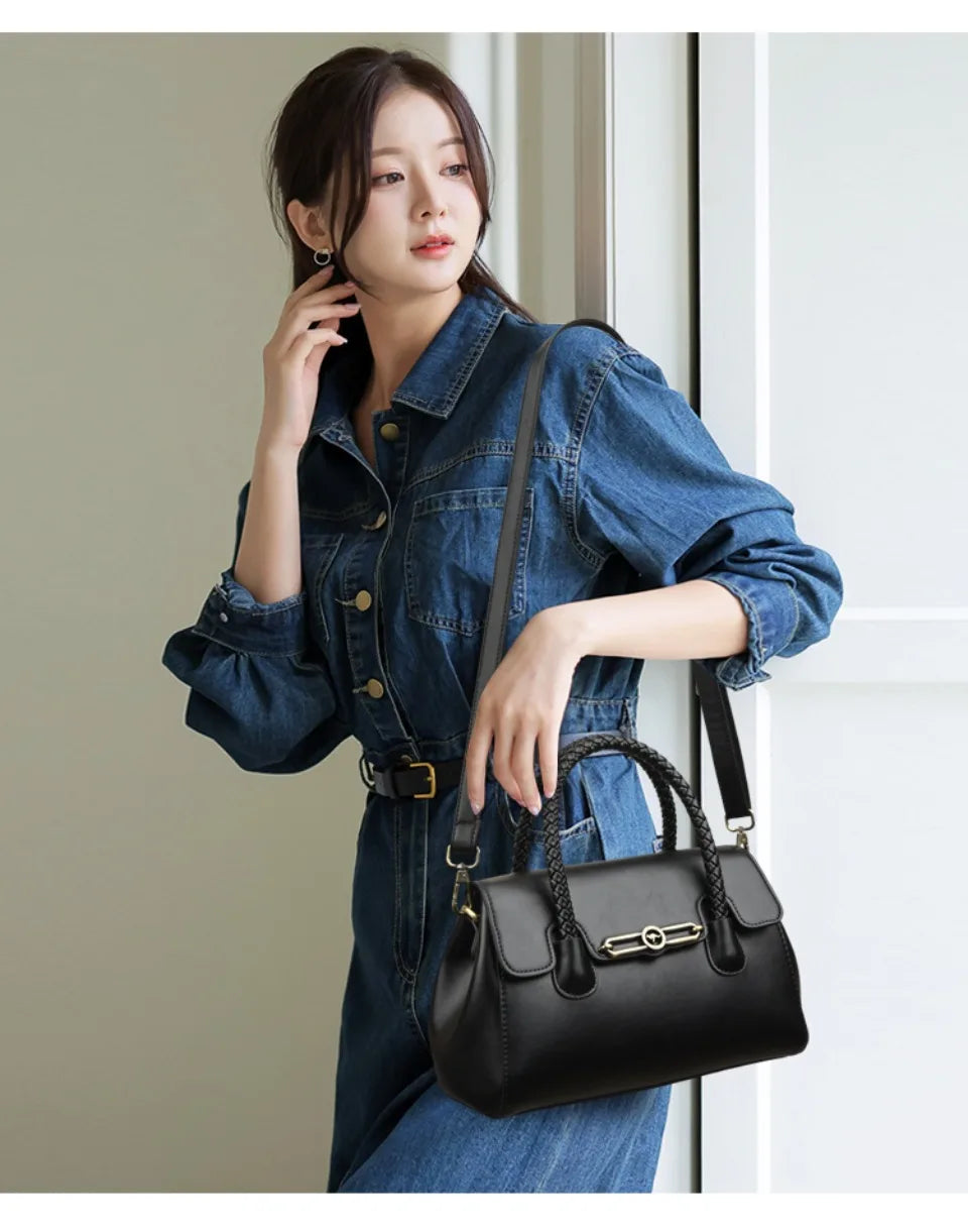 ronja™ – Classic Handbag with Woven Handle and Gold Accents