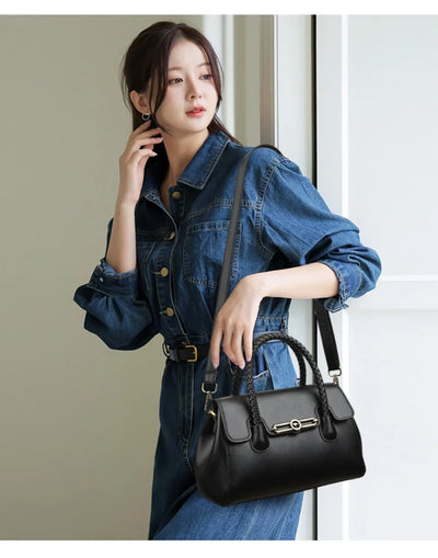 ronja™ – Classic Handbag with Woven Handle and Gold Accents